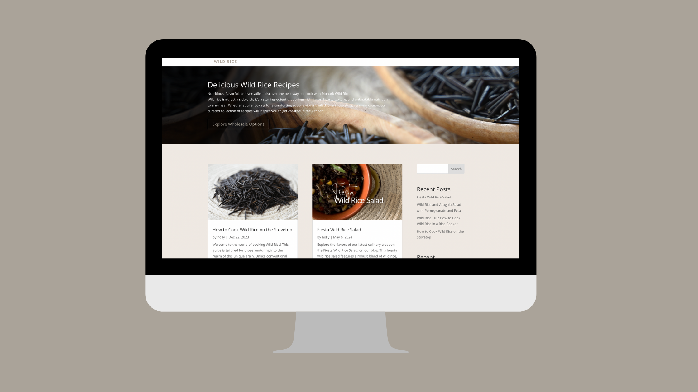 Monark Wild Rice Blog Page – Recipe Content that Converts Computer mockup displaying the Monark Wild Rice blog page featuring wild rice recipes like Fiesta Wild Rice Salad and stovetop cooking tips