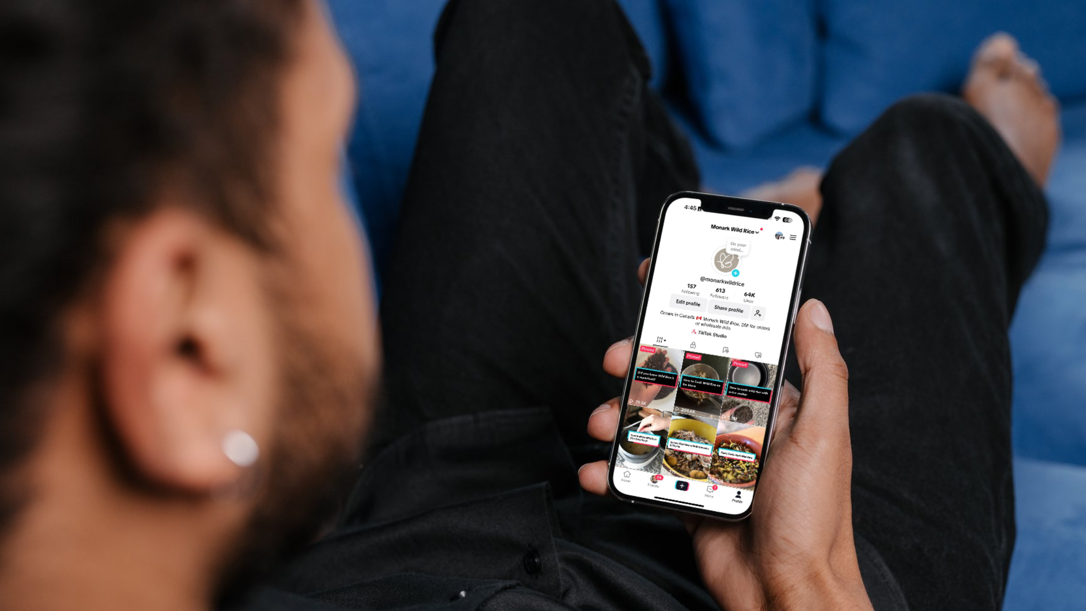 Monark Wild Rice TikTok Optimization A phone screen displays Monark Wild Rice’s TikTok profile, with a matching handle and display name, keyword-focused bio, link in bio, and pinned videos