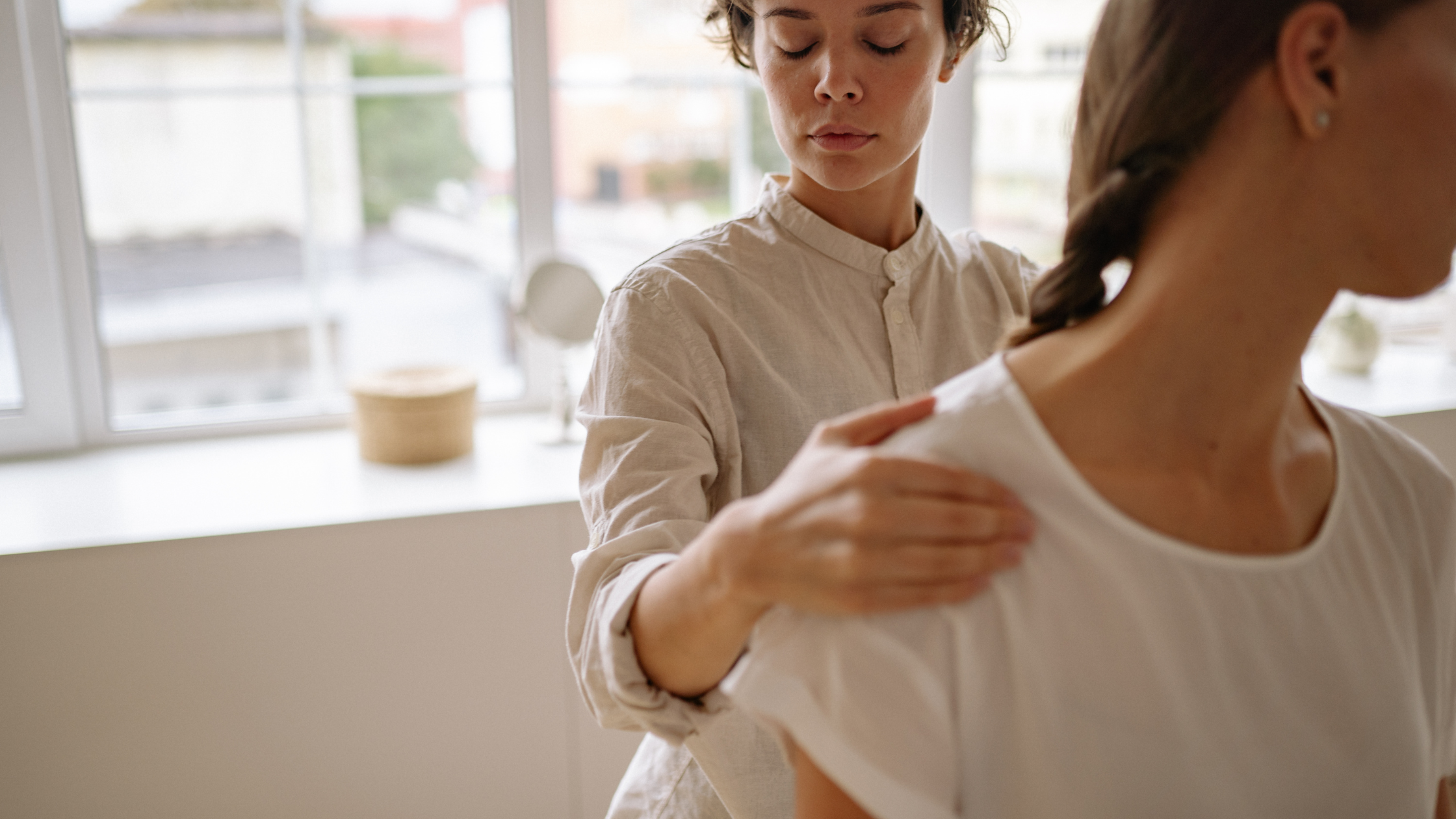 Mobility Assessment with Patient in Clinic Healthcare provider guiding a seated patient through a shoulder mobility check in a bright clinic setting.</p>
<p>