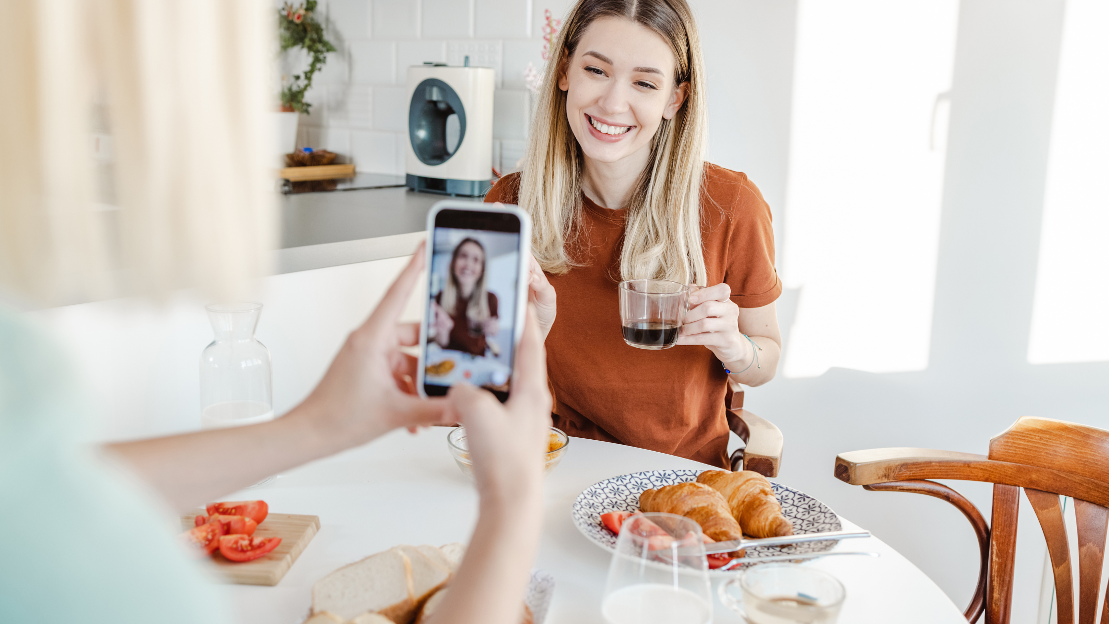 Lifestyle creator being photographed for social media brand content at home