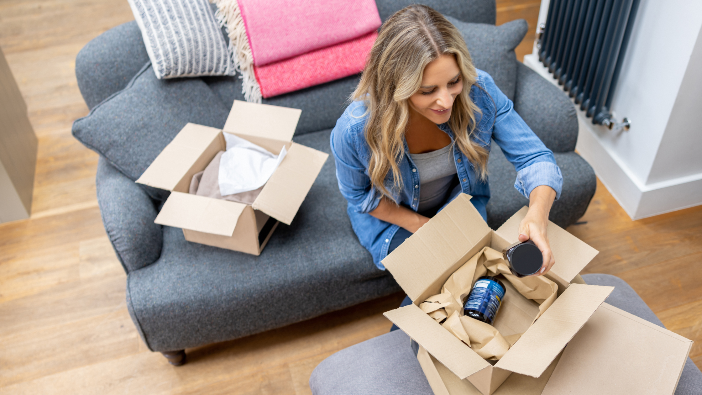 Creator unboxing seeded products at home to create organic content for paid amplification